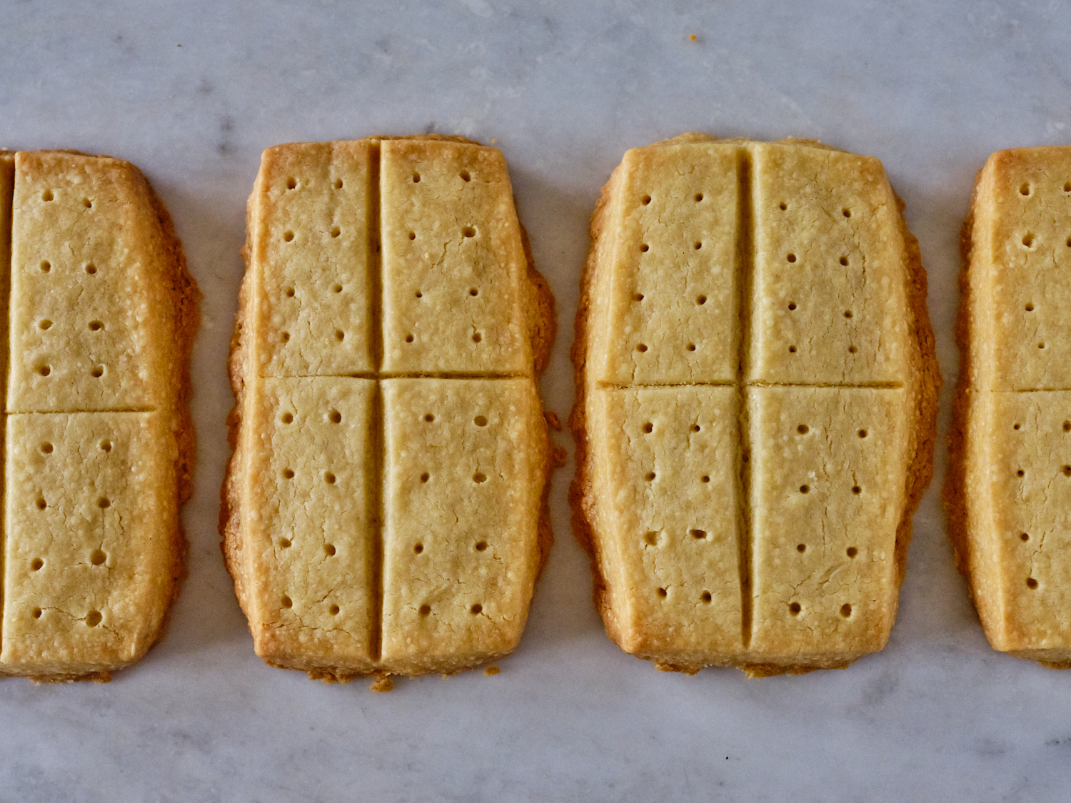 A Close-up of Four Freshly Baked Shortbread Cookies