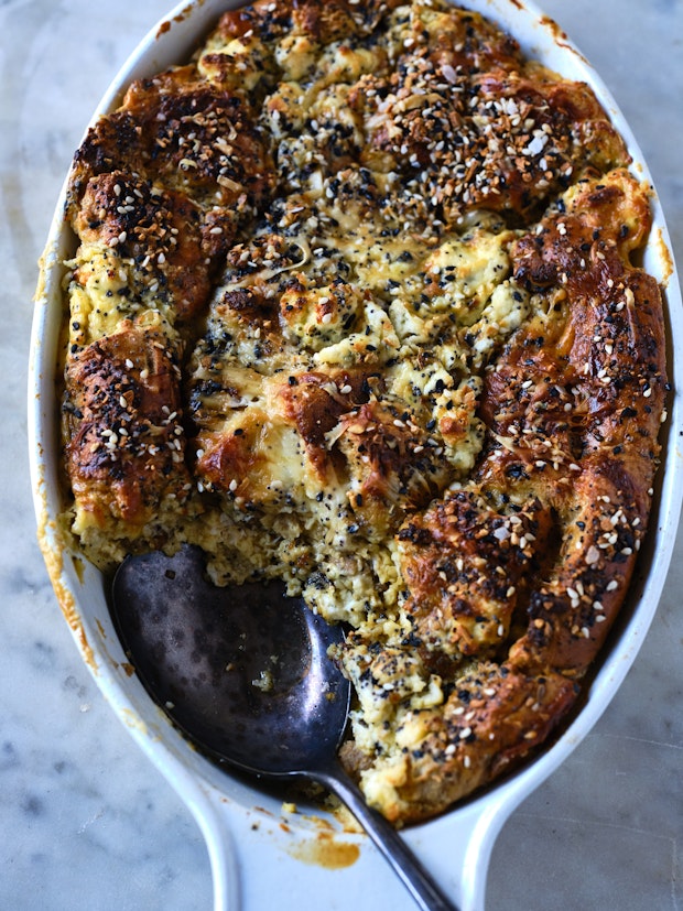 Top down view of Breakfast Casserole with spoon in baking dish