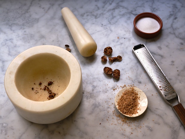Grating Nutmeg with Microplane Grater for Butter Cake