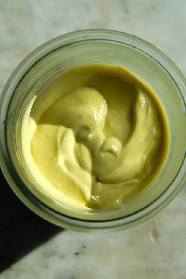 Caesar salad dressing in a glass jar