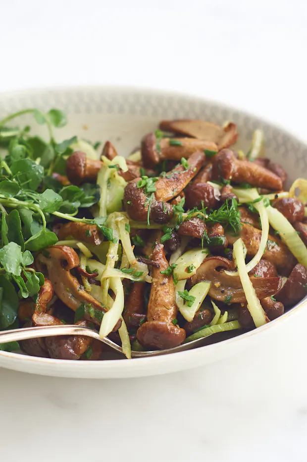 Fennel mushrooms served in a white bowl