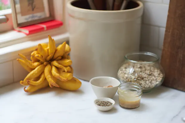 toppings for four grain cereal arranged on a counter