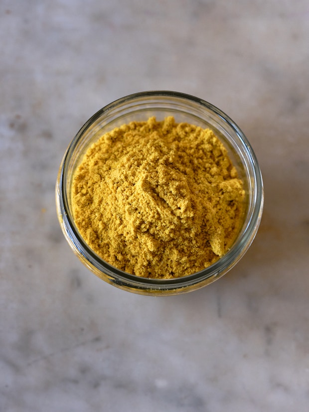 Top Down Photo of Homemade Bouillon Powder in a Small Glass Jar