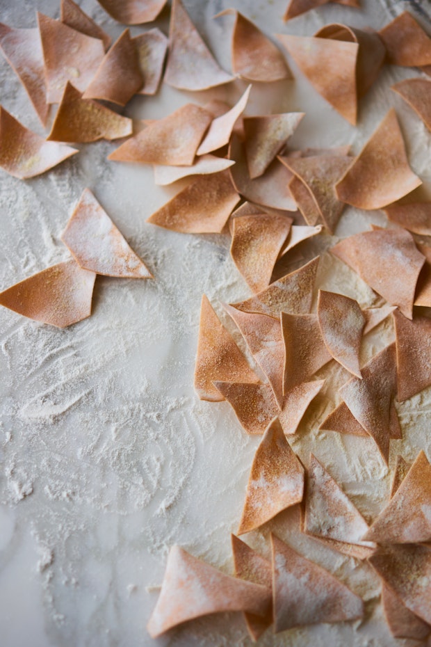 Maltagliati cut on a marble counter