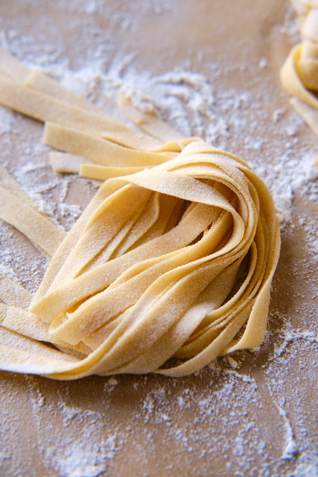 tagliatelle pasta dusted with flour