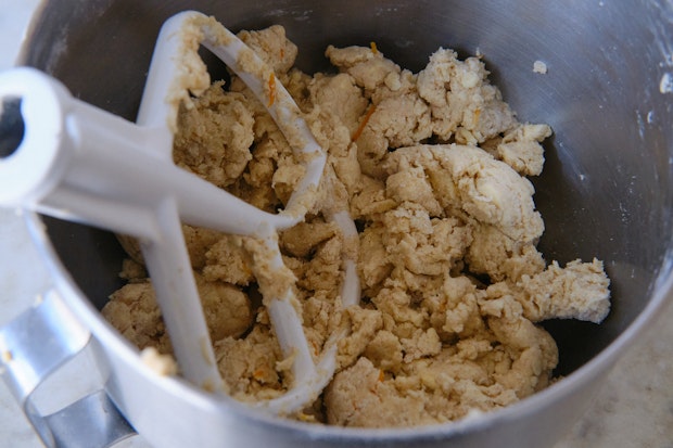 Scone dough in a stainless steel mixing bowl