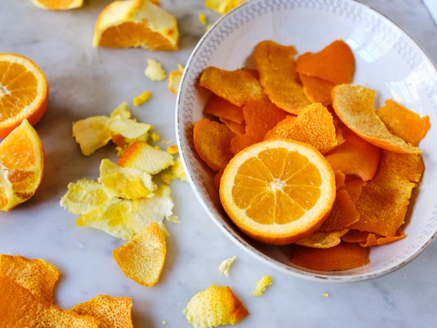 Oranges Being Peeled