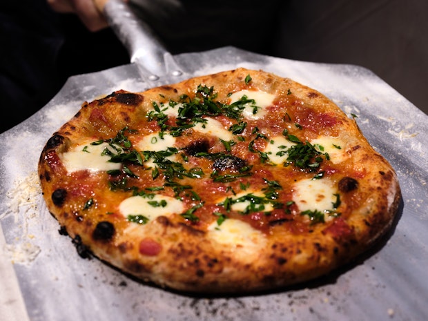 Margherita Pizza with Chives Instead of Basil on Pizza Peel