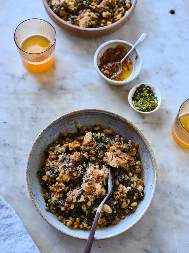 Ribollita, a beautifully thick Tuscan stew with dark greens, lots of beans, veggies, olive oil and tied with bread from the day before