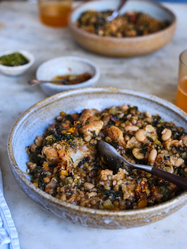 Ribollita, a beautifully thick Tuscan stew with dark greens, lots of beans, veggies, olive oil and tied with bread from the day before