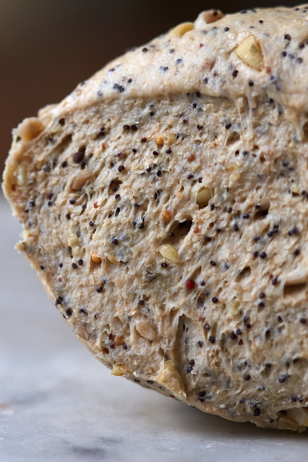 cross-section of seeded flatbread dough