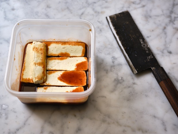 Marinating Ingredients with Knife on the Side