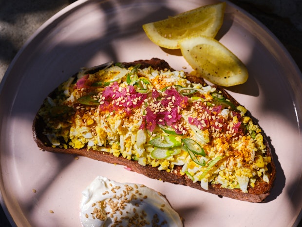 Shredded Egg Salad Sandwich Open-faced on a Plate