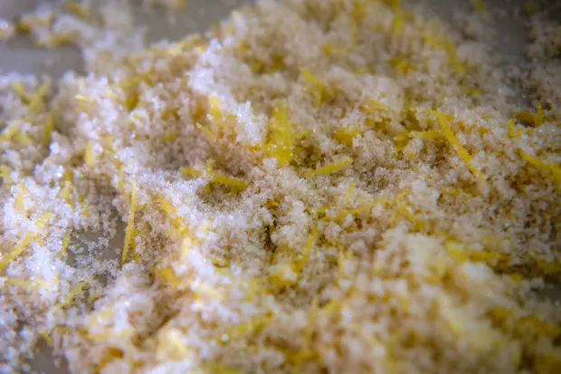 Sugar and lemon zest in a pot