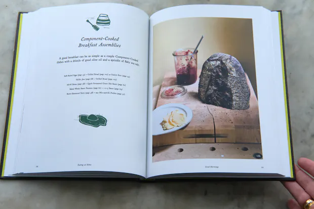 Eating at Home cookbook page picturing skillet jam and sourdough bread on a cutting board