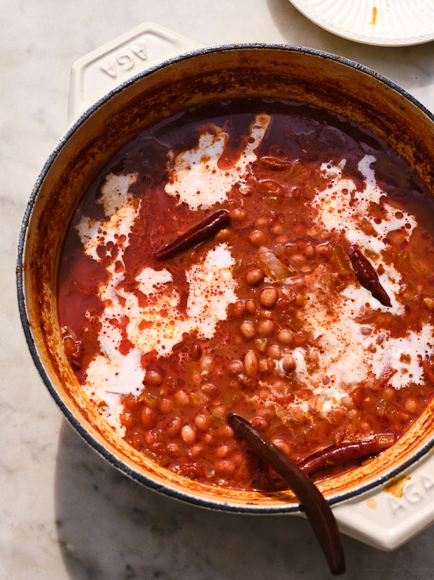 A White Pot of Slow-Cooked Beans made with Chiles and Coconut