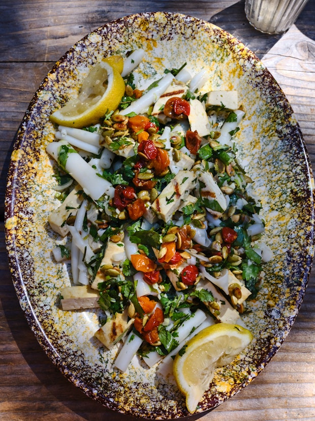 Spicy Coconut Milk Dressing Over Rice Noodles on a Plate