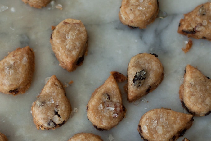 Toasted almond and sable biscuits cut into teardrop shapes