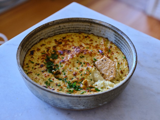 Close up of baked artichoke dip