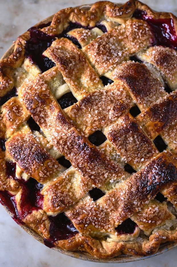 berry pie with a lattice top in a pie plate