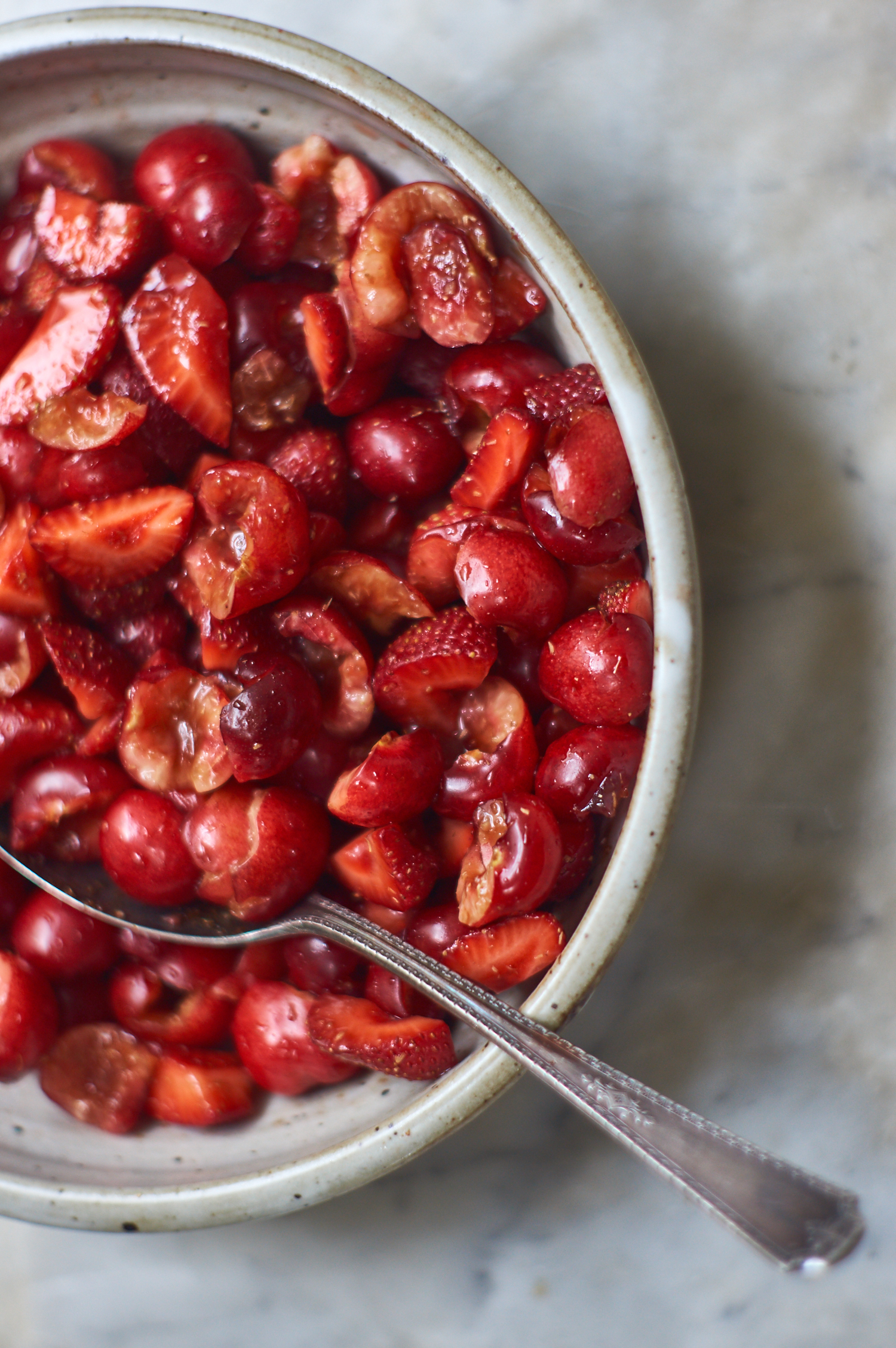 Simple Red Fruit Salad with Strawberries, Cherries, Lemon, and Brown Sugar