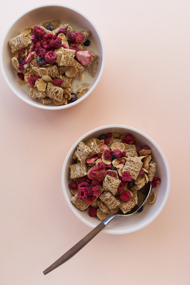 two bowls filled with breakfast cereal
