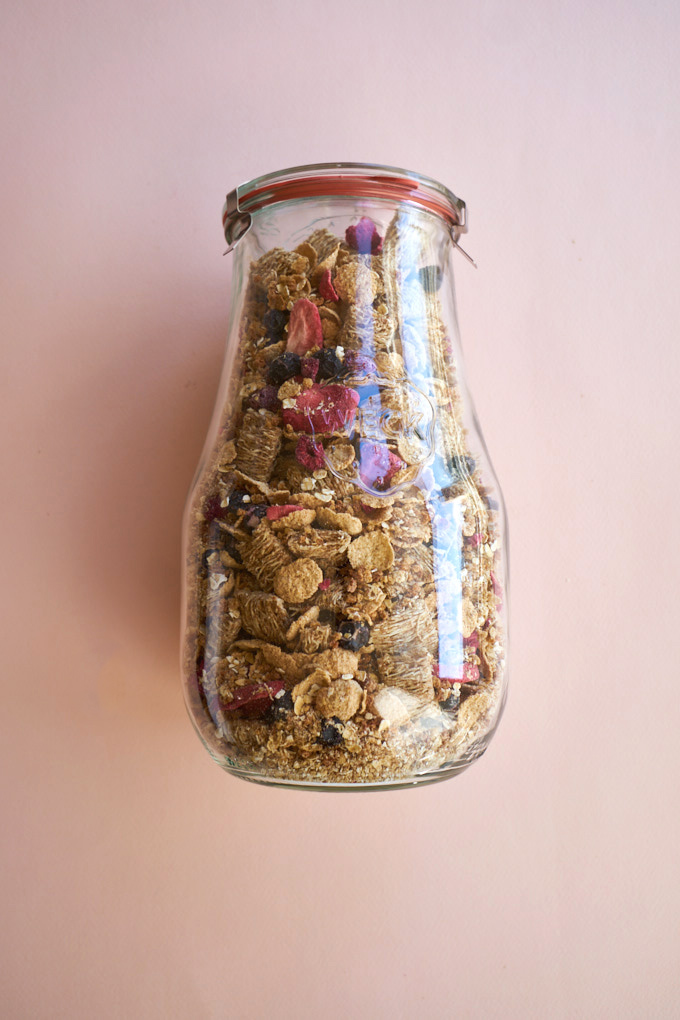 A large jar filled with homemade breakfast cereal