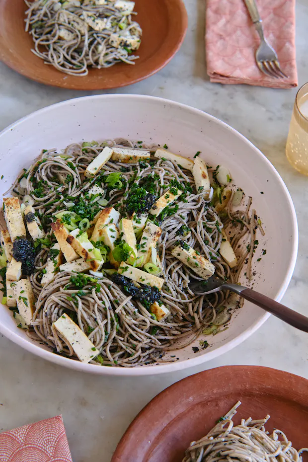 black sesame otsu noodles in a bowl on a table for lunch