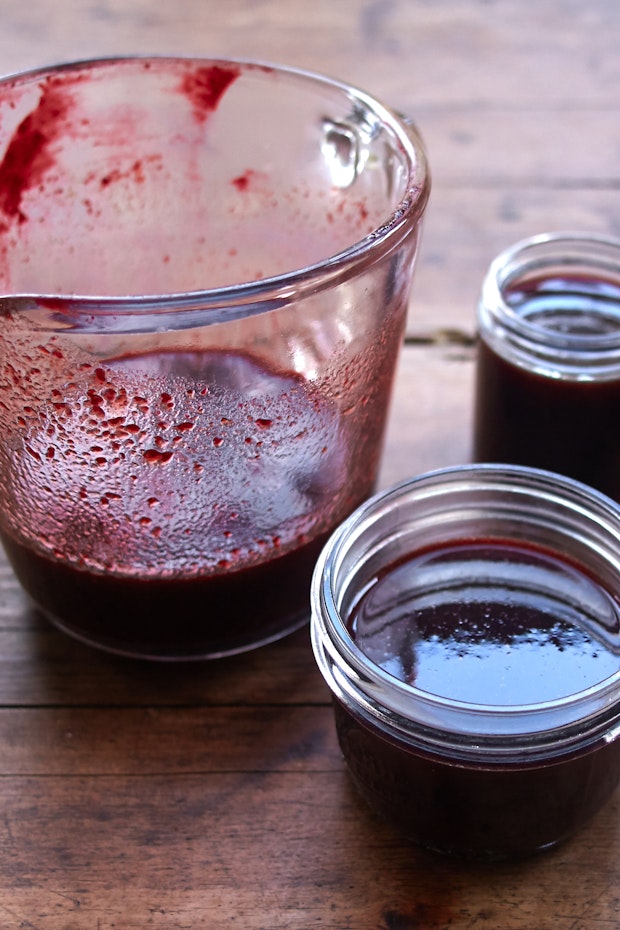 jars of homemade blackberry syrup
