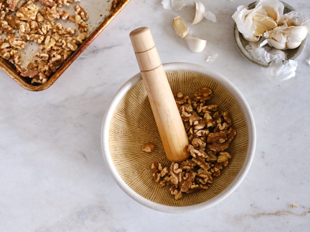 Walnuts in mortar and pestle