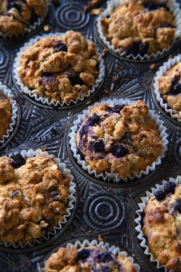 blueberry muffins after baking in a baking tin