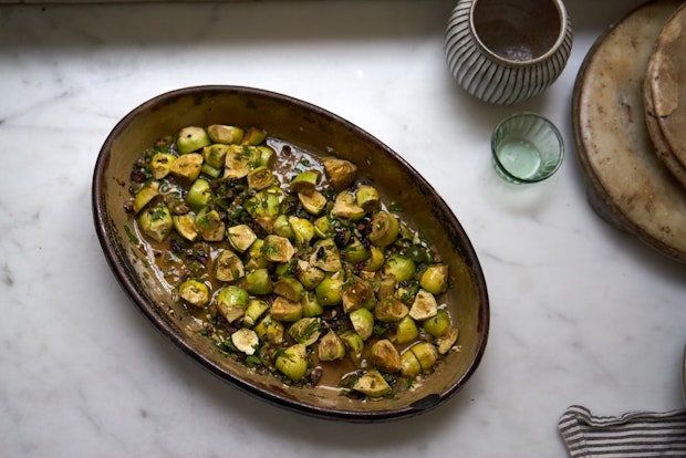 braised artichokes in a baking dish