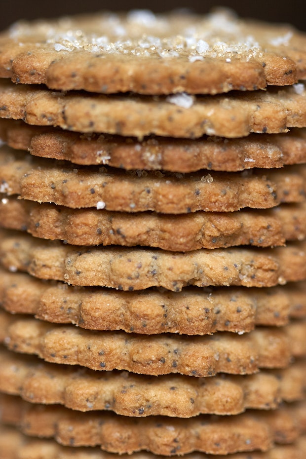 side view of a stack of thin cookies