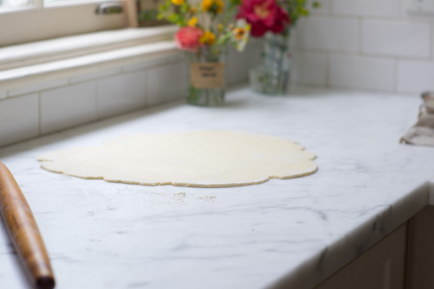 Rolled dough on marble table