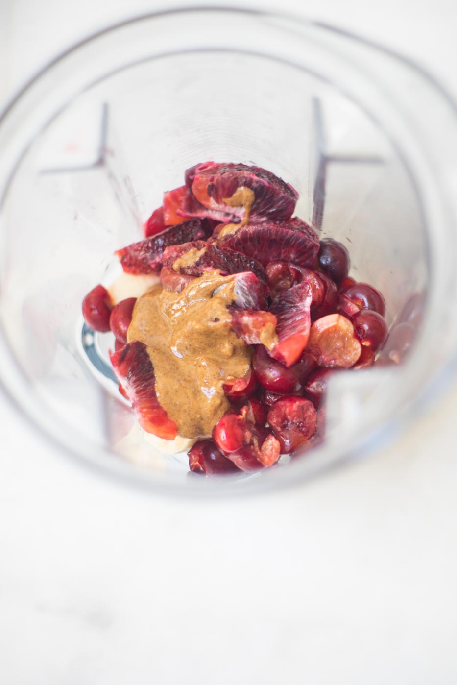 Cherry Smoothie ingredients in a blender