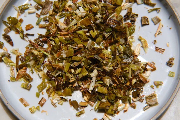 scallions cut into flecks for cherry tomato tart topping and filling
