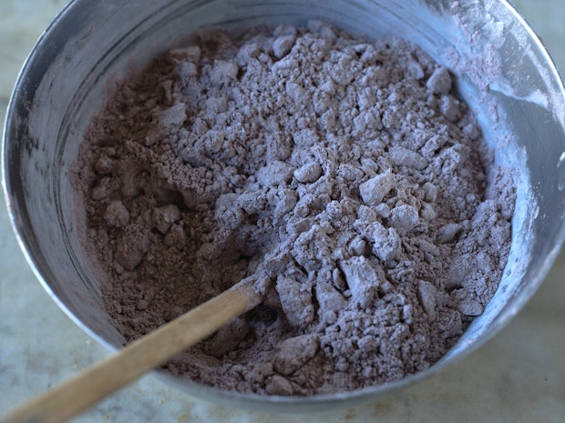 chocolate cookie dry ingredients combines in a mixing bowl