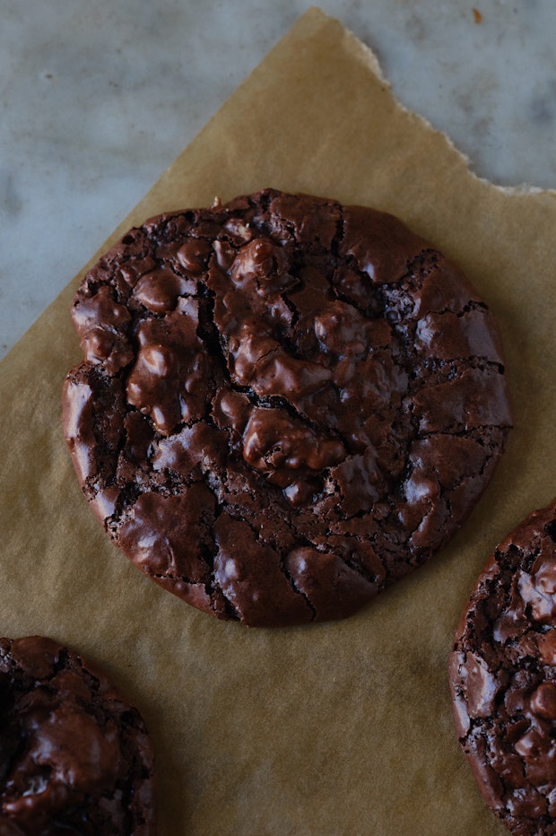 chocolate cookies on parchment paper after baking