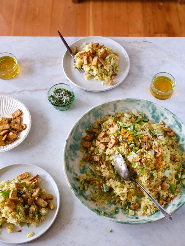 Super Orange Citrus Rice Surrounded by Plates and Ready to Eat