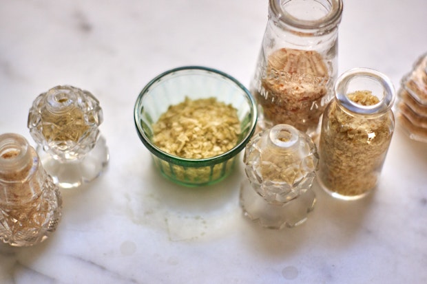 a range of homemade citrus salts in glass jars