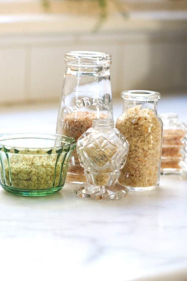a range of homemade citrus salts in glass jars