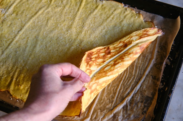 Cottage cheese wrap on a rimmed baking sheet after baking