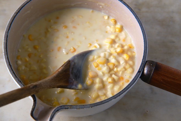 making creamed corn in a saucepan