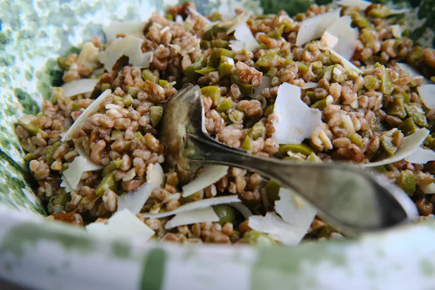 Farro Salad with Olives and Pecorino in a large serving bowl