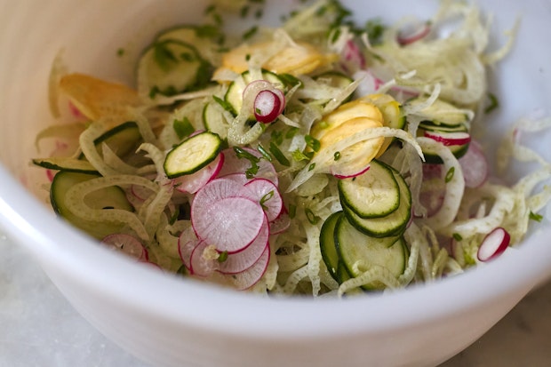 farro salad in a bowl prior to adding dressing