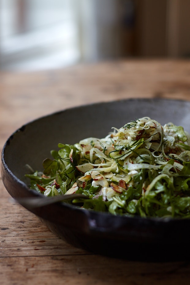 shaved fennel salad in a salad bowl