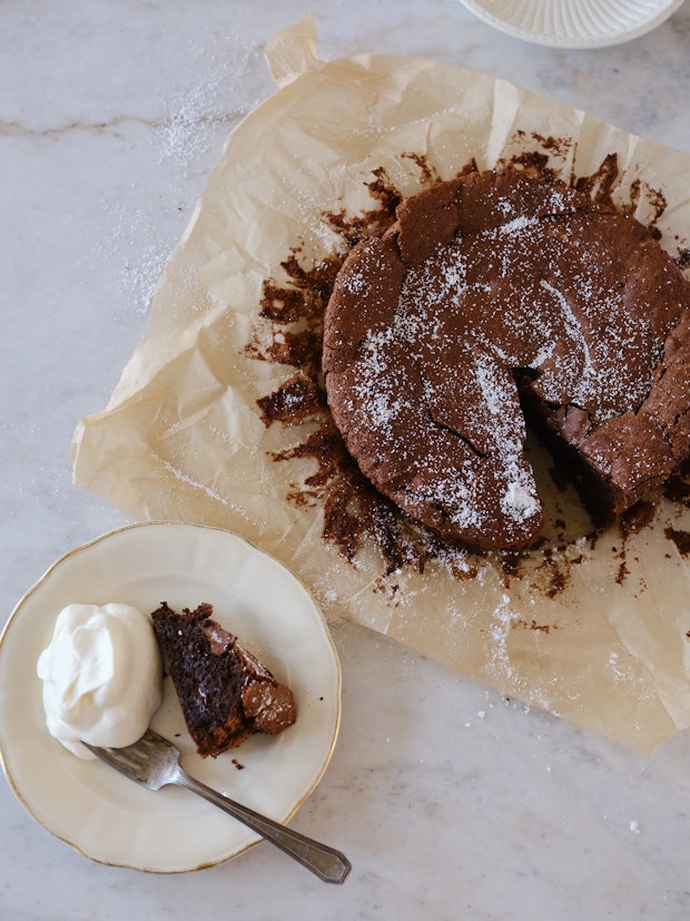 Flourless Chocolate Cake on a Piece of Parchment Paper