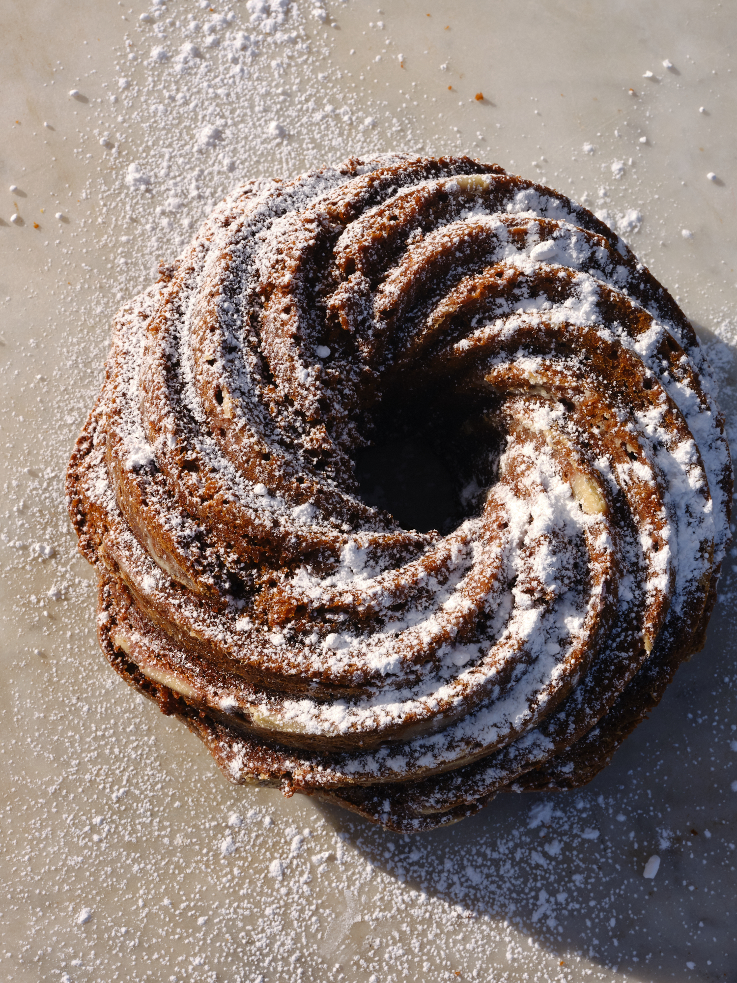 Black Sticky Gingerbread Dusted with Powdered Sugar