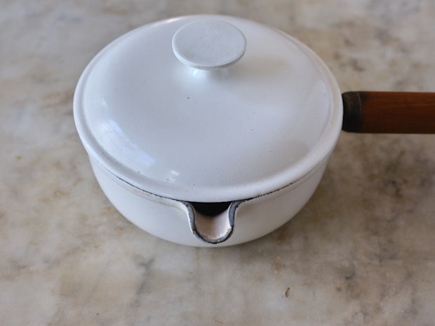 a saucepan with lid on