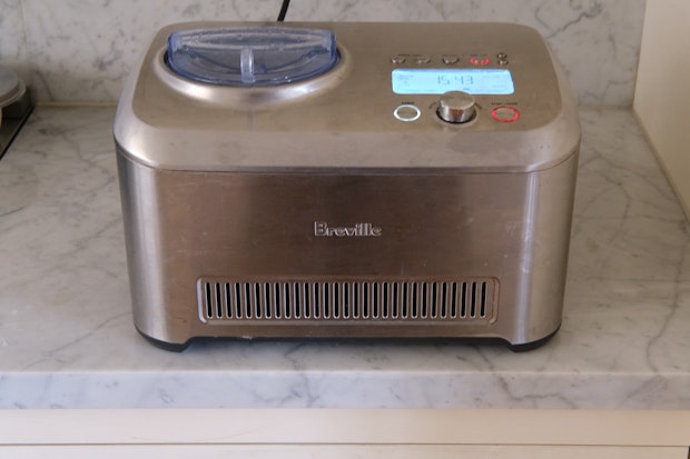 ice cream maker sitting on counter in kitchen